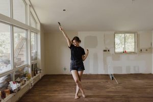 Joyful dance in a room under renovation