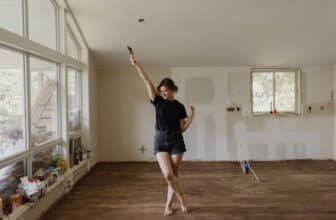 Joyful dance in a room under renovation
