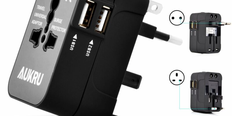 Adaptateur secteur universel, chargeur de voyage avec 2 ports USB (5V 2.1A). Adaptateur compatible avec 183 pays (EU/US/UK/AU). Douille universelle – Coloris: Noir