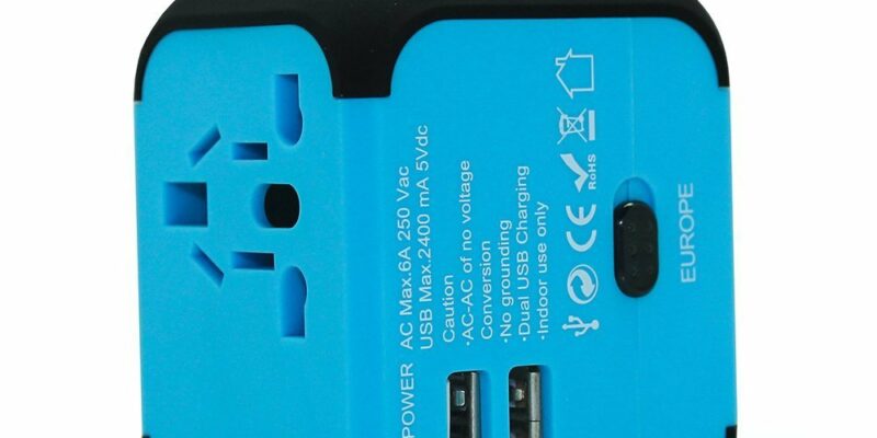 Adaptateur de voyage universel pour prises électriques. Chargeur avec 2 ports UBS (2,4 A), fusible extractible. Compatible en Europe, Etat-Unis, Grande-Bretagne, Australie, NZ Japon, et plus de 150 pays